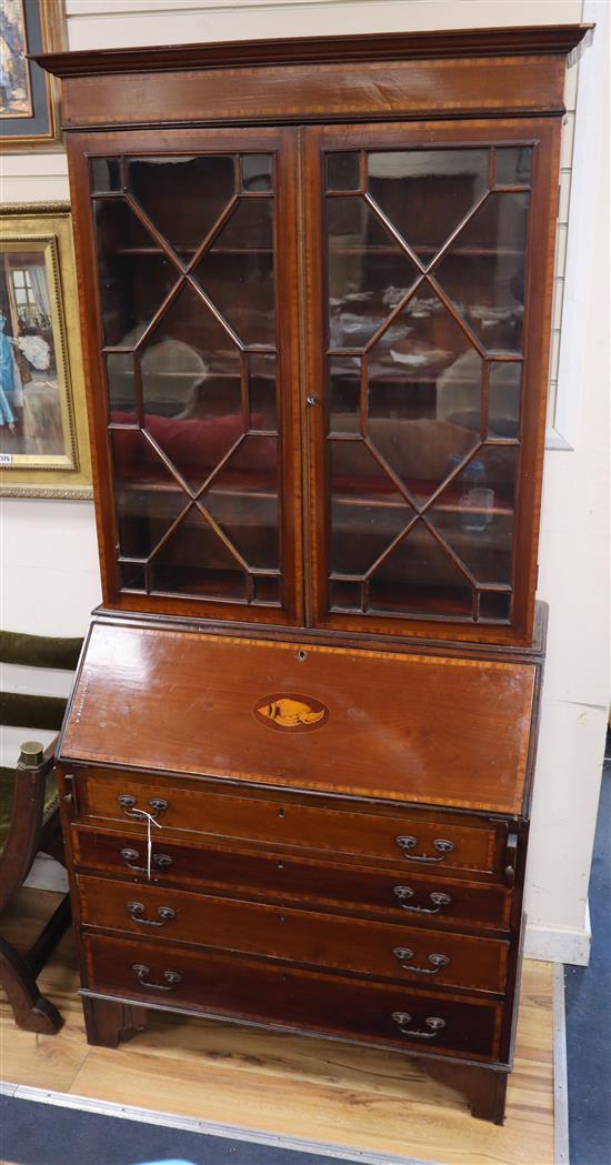 An Edwardian inlaid mahogany cross-banded bureau bookcase W.92cm